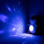 Kép 2/4 - Chipolino projektoros zenélő plüss játék - Penguin