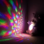 Kép 2/4 - Chipolino projektoros zenélő plüss játék - Lamb
