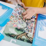 Kép 2/3 - Melissa & Doug kreatív játék, pufi matrica füzet, Mancs Őrjárat - Dzsungel
