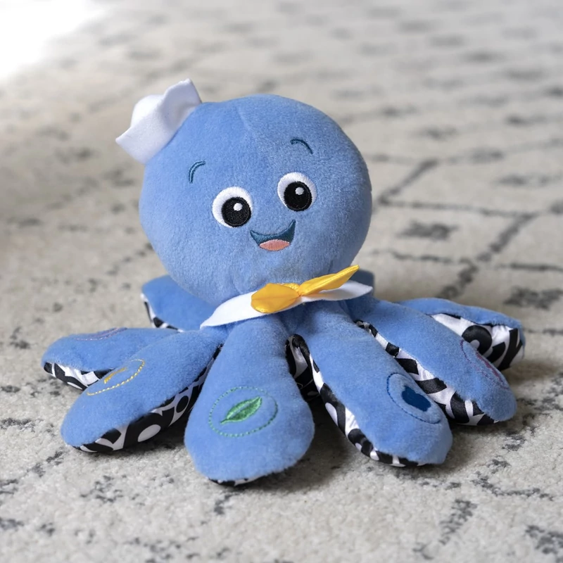 BABY EINSTEIN Zenélő játék polip Octoplush™ 3m+