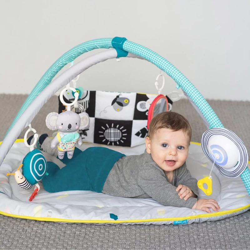 Taf Toys játszószõnyeg All Around Me játékhíddal 12435